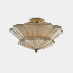Calyra beige pleated fabric semi-flush ceiling light with warm gold hardware, studio front view on white background showing two-tier scalloped design