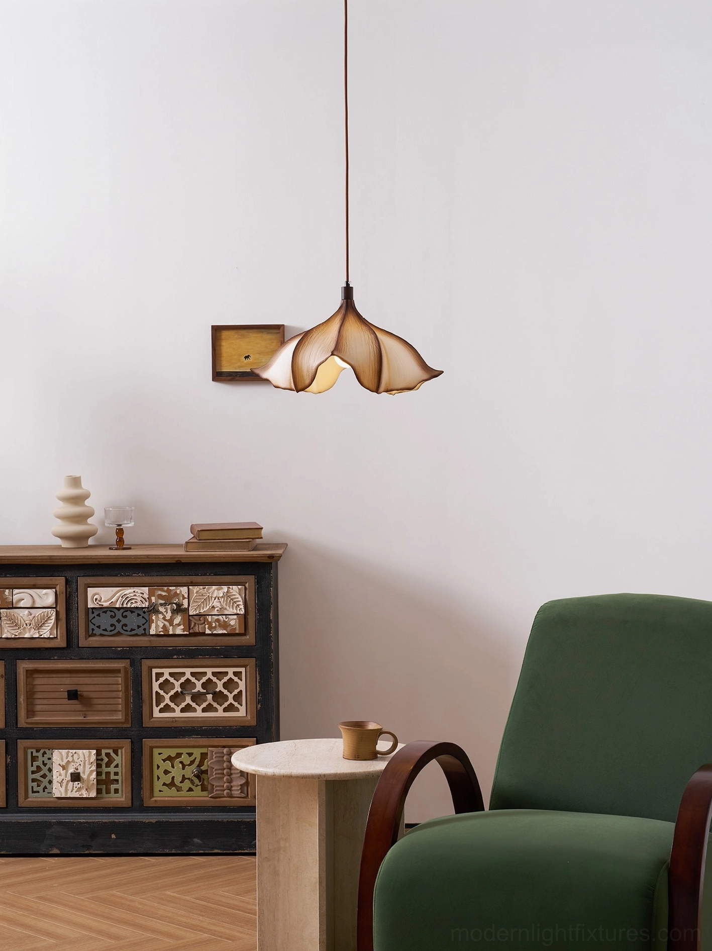 Calysa pendant fixture installation view showing adjustable 150cm hanging wire and metal hardware attachment