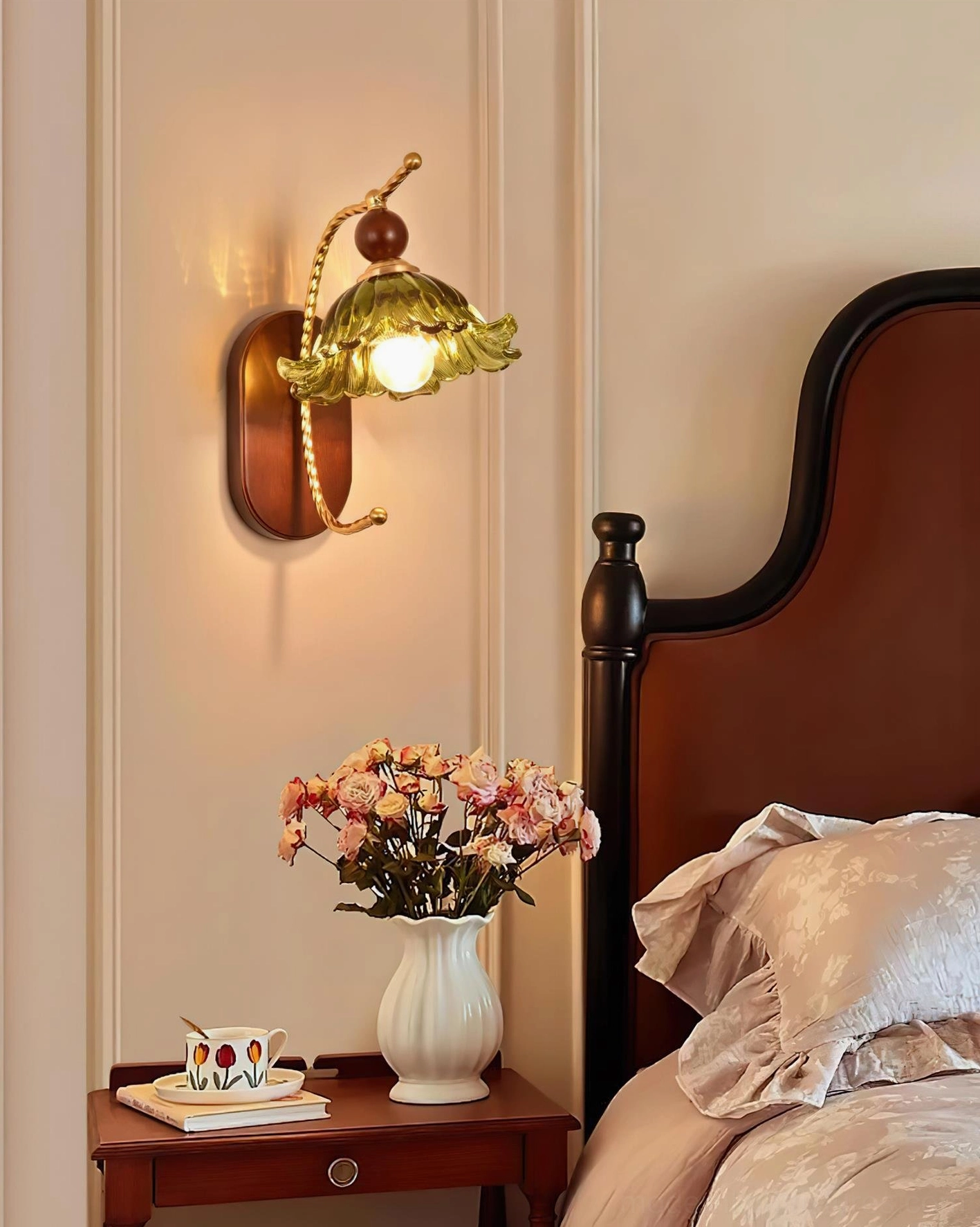 Calyx retro wall sconce lamp fixture mounted on interior wall with decorative styling