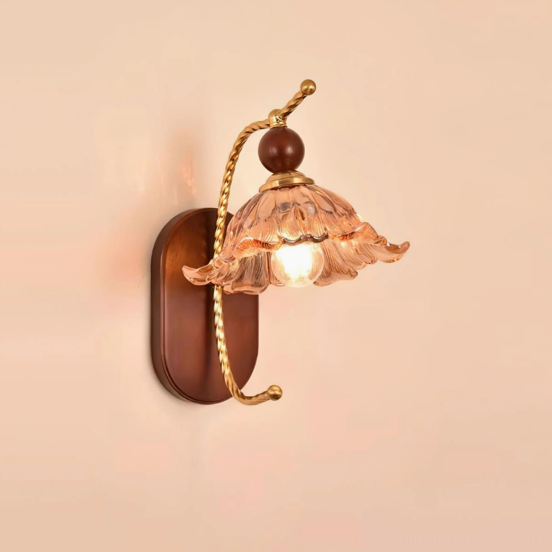 Calyx decorative wall sconce with beige lampshade and brass arm vintage-inspired design