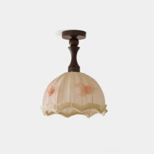 Camélia pleated fabric ceiling lamp with pink floral appliqués and scalloped linen trim on white background - vintage-inspired semi-flush fixture