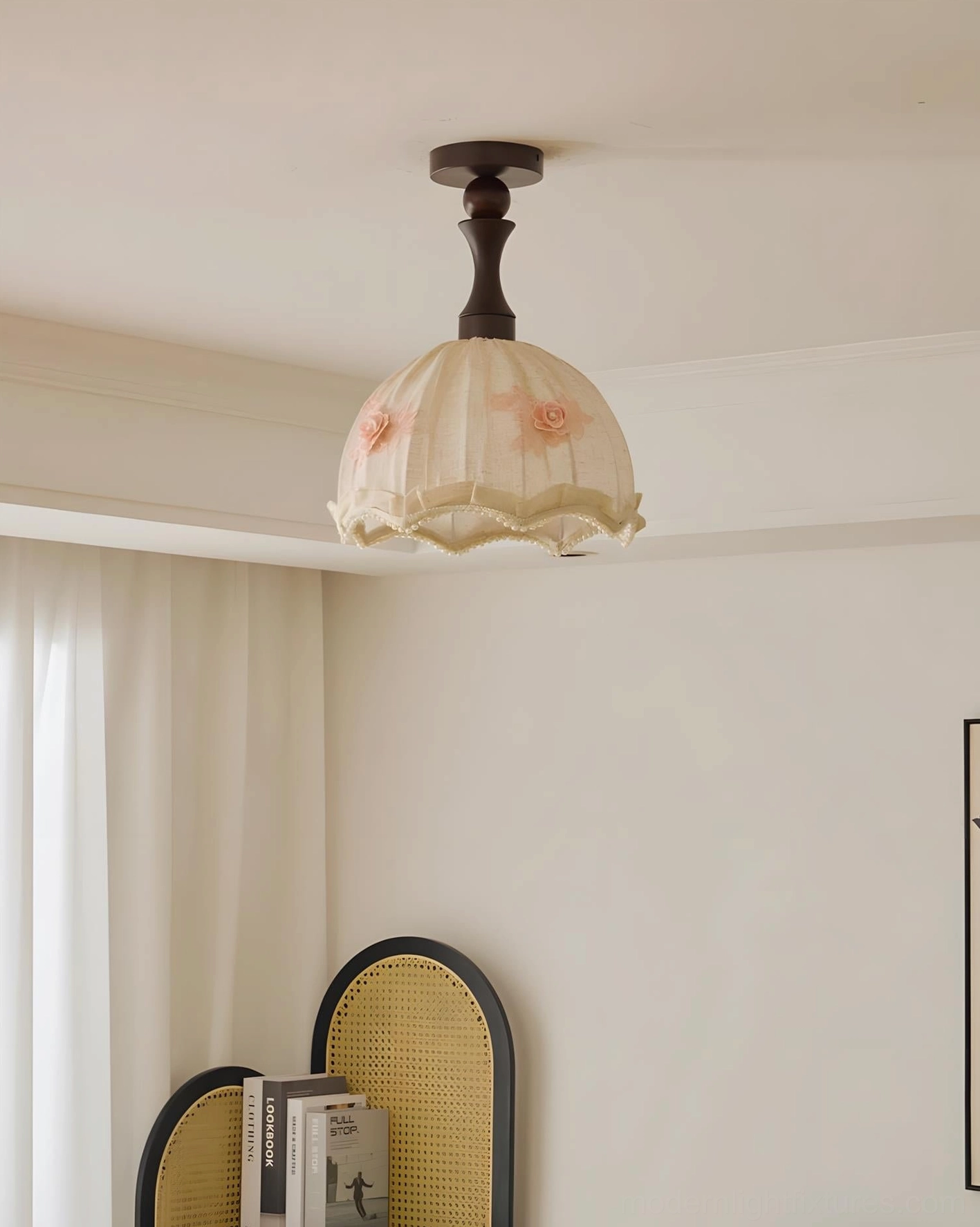 Camélia fabric ceiling fixture with rose details and dark turned base in empty beige room - unlit overhead view