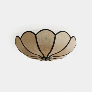 Camellia petal ceiling light fixture with beige fabric and black metal frame, front studio view