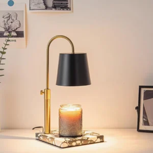 Contemporary candle warmer lamp black fabric shade brass gold adjustable arm three-quarter bedroom nightstand view