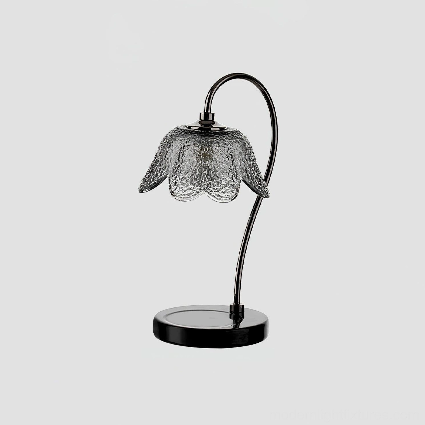 Black marble base candle warmer lamp with textured glass shade on neutral studio background