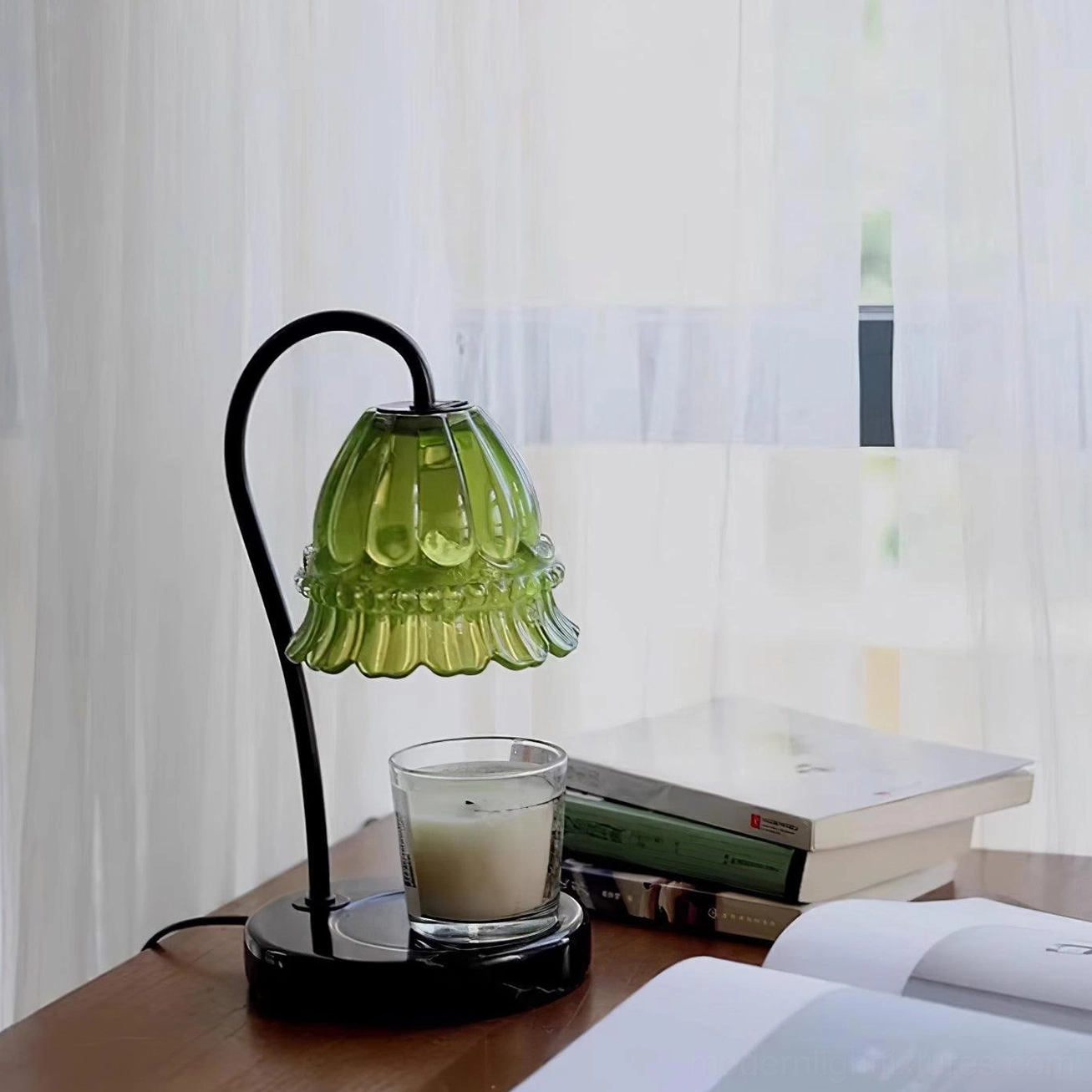 Modern marble candle warmer lamp paired with decorative home office accessories