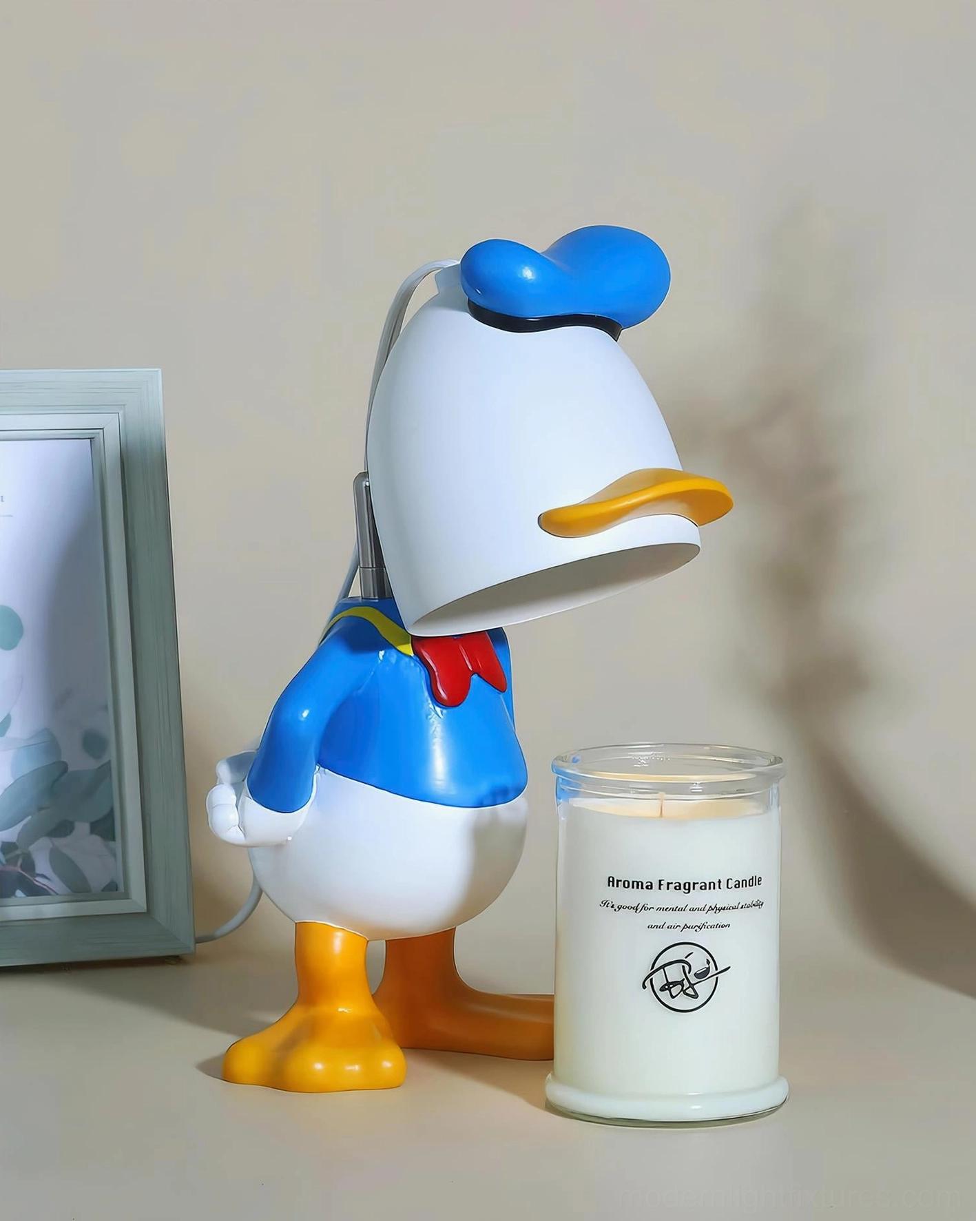 Character candle warmer lamp packaging and unboxing display showing product presentation and included components