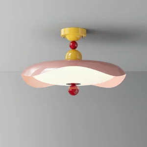 Illuminated Candy Pop Ceiling Light with pink shade and red bottom accent showing glossy painted finish and sculptural design