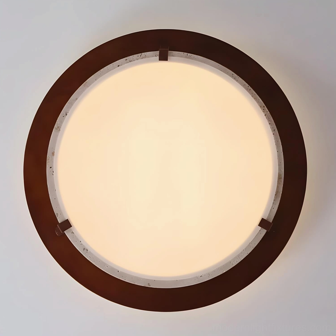 Cantera travertine ring ceiling light showing natural stone texture and organic surface character