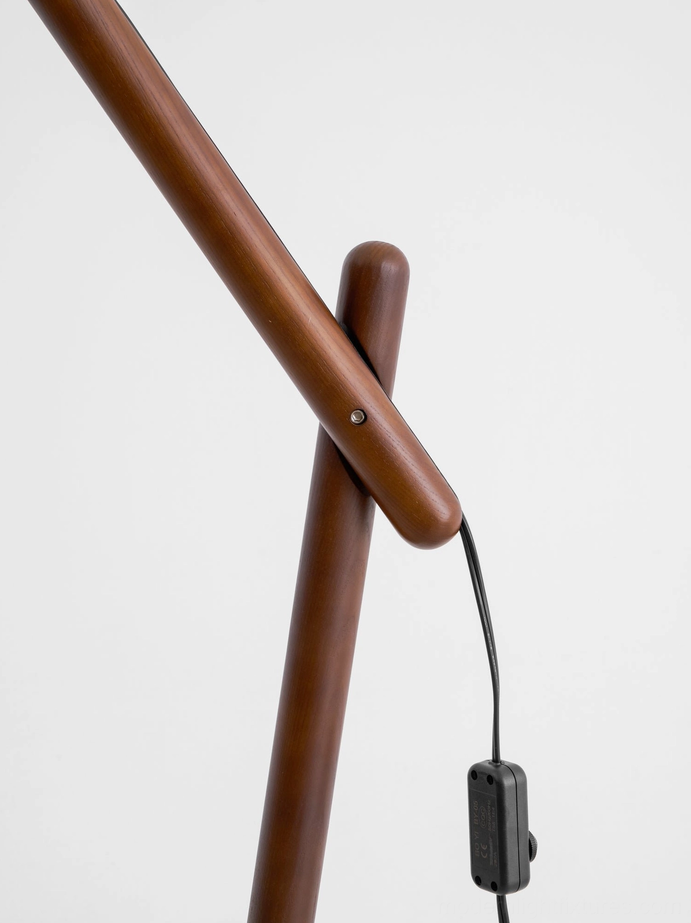Modern cantilever floor lamp featuring wood and fabric with metal components in sophisticated design
