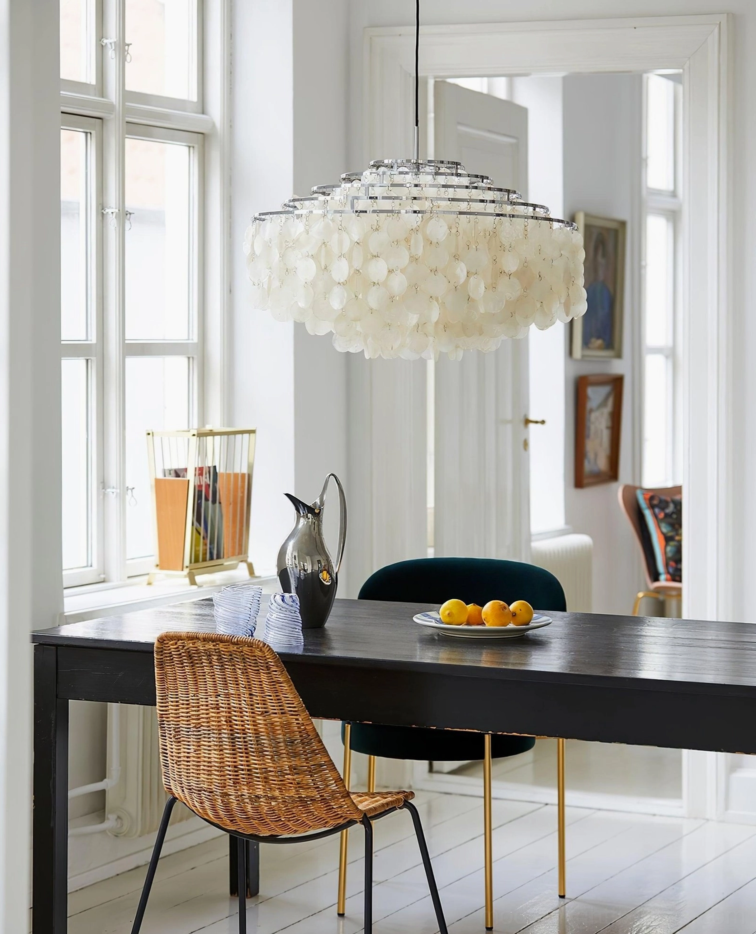 Capiz shell chandelier installed in luxury modern home interior with elegant lighting ambiance
