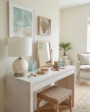 Capiz shell table lamp on bedroom vanity with mirror and coastal bedroom décor styling