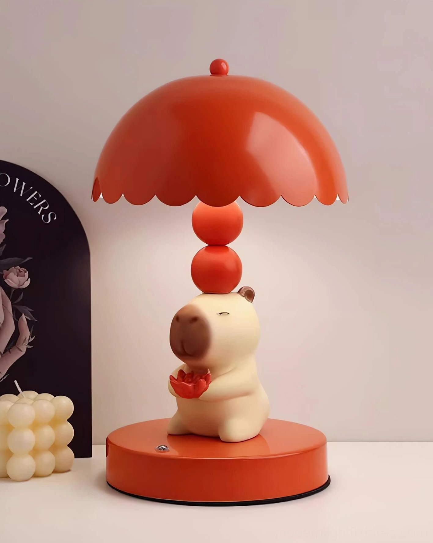 Capybara table lamp base construction showing metal and resin craftsmanship