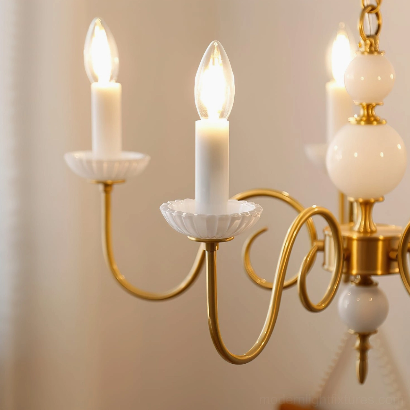 Carlita candle chandelier curved brass arms classic lighting fixture design