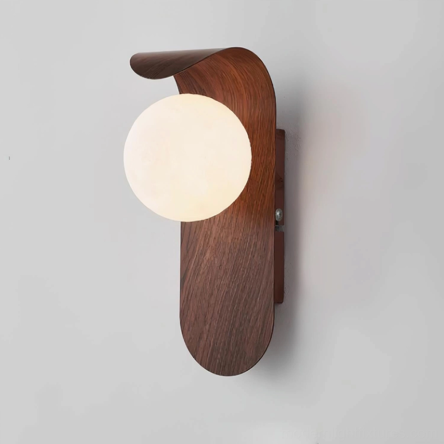 Carlyle wall sconce pair flanking archway in traditional home architecture setting