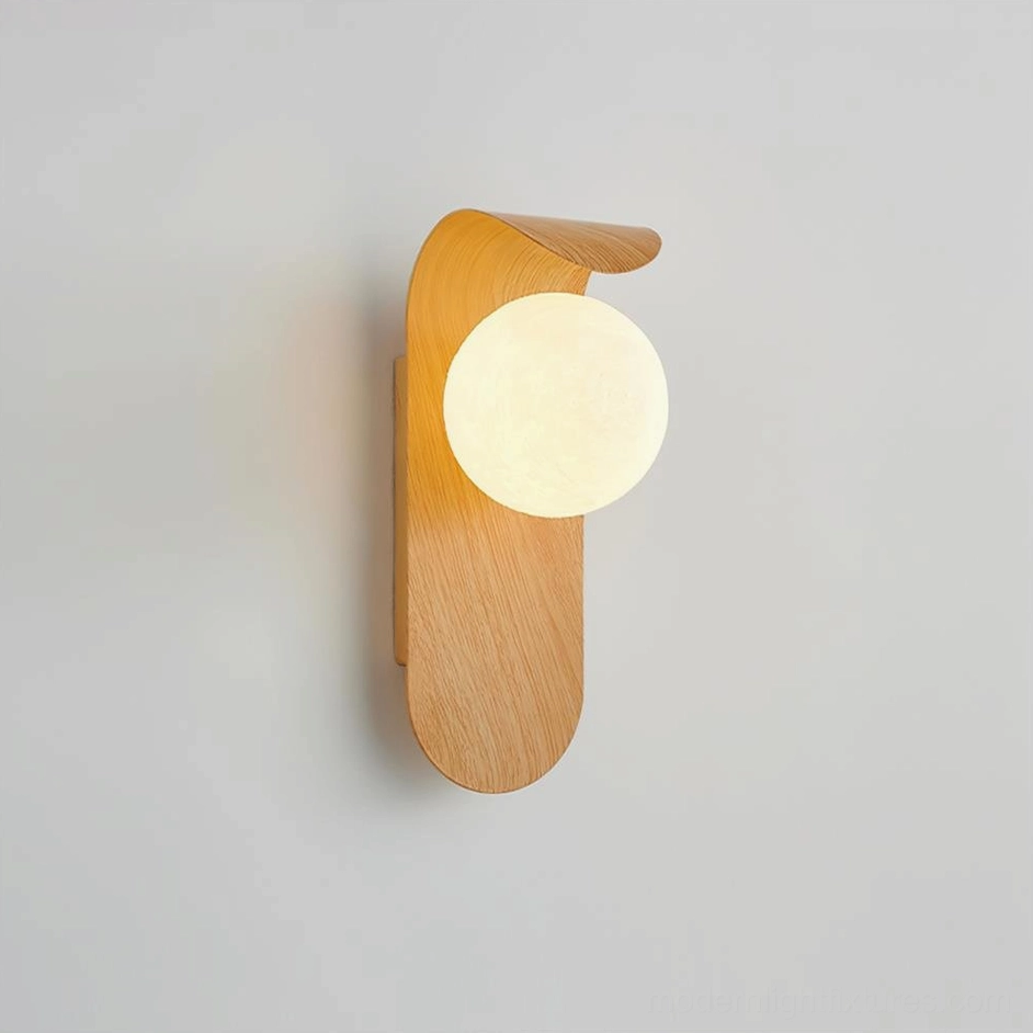 Pair of Carlyle wall sconces wood-color finish symmetrically mounted creating balanced bedroom lighting