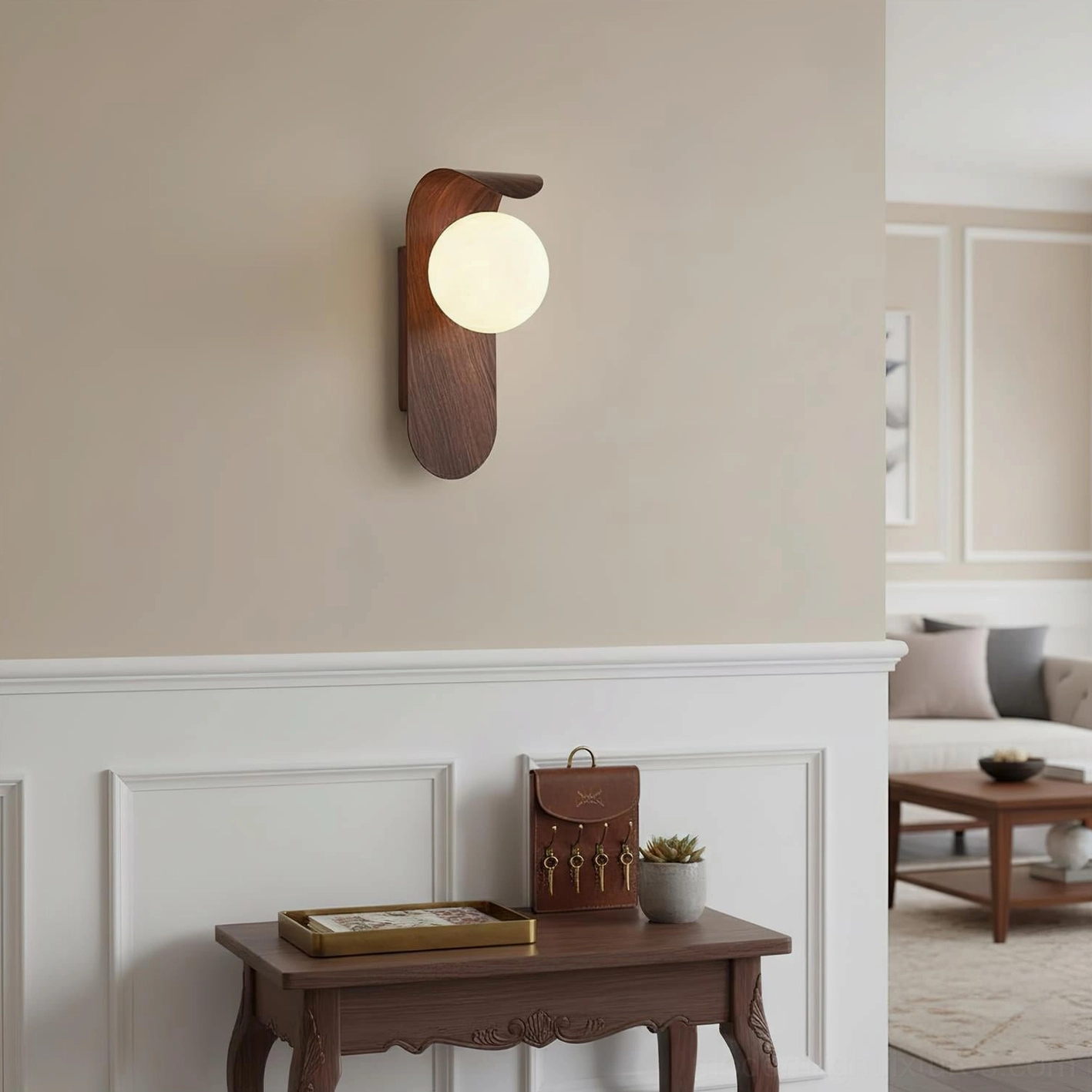 Close-up detail of Carlyle wooden wall sconce installed in residential living room, curved metal arm with opal glass diffuser