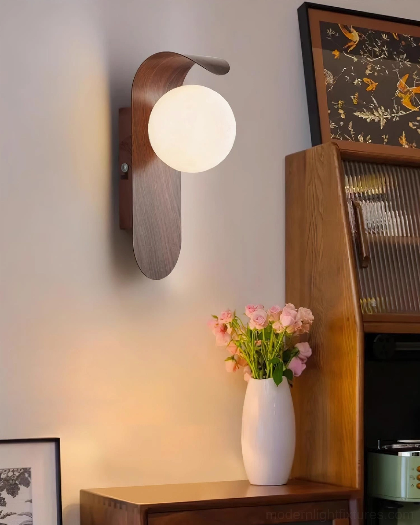 Carlyle hardwired wall sconce mounted in hallway entry creating focal point accent lighting