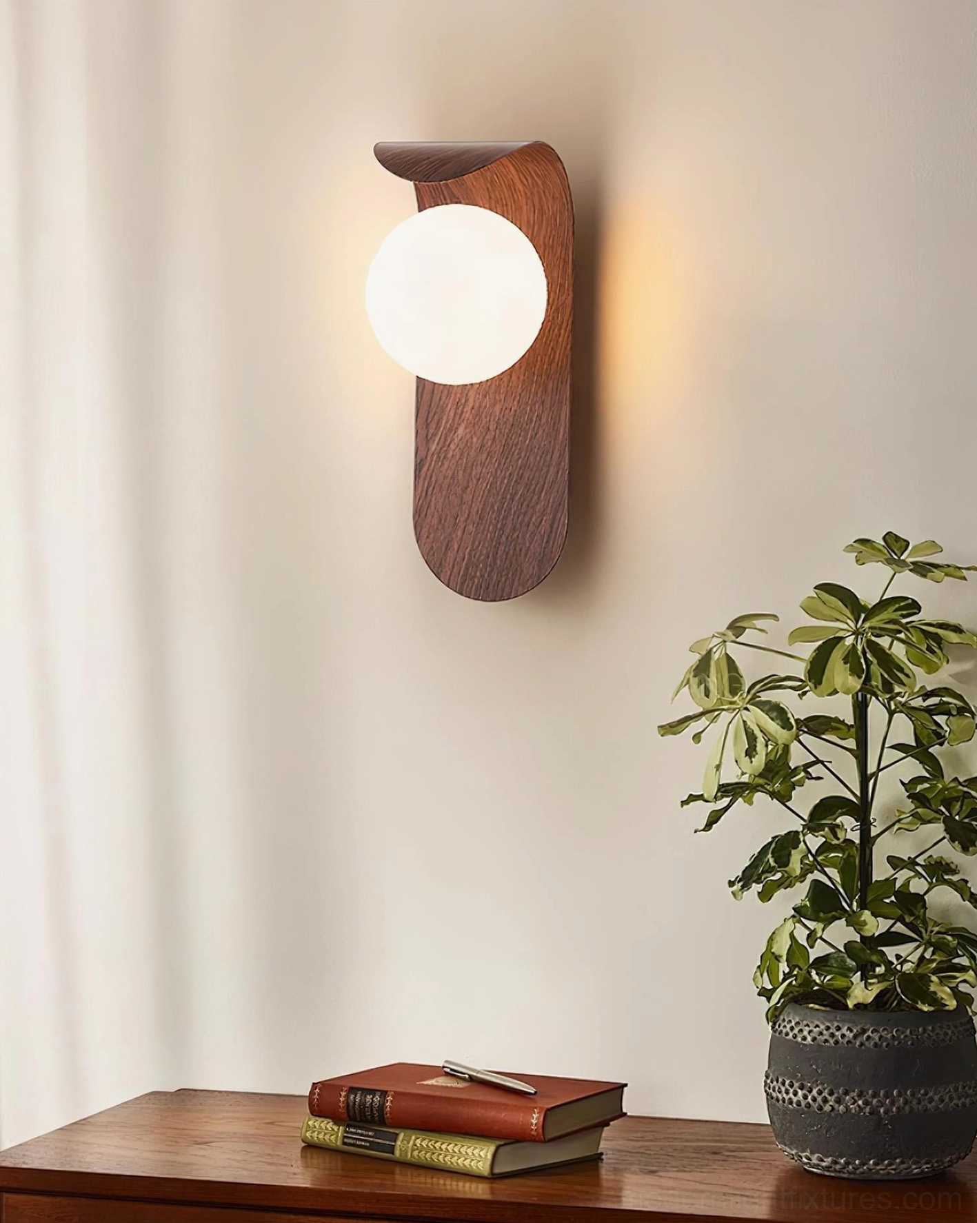 Carlyle wooden wall sconce mid-century modern design inspiration curved arm aesthetic
