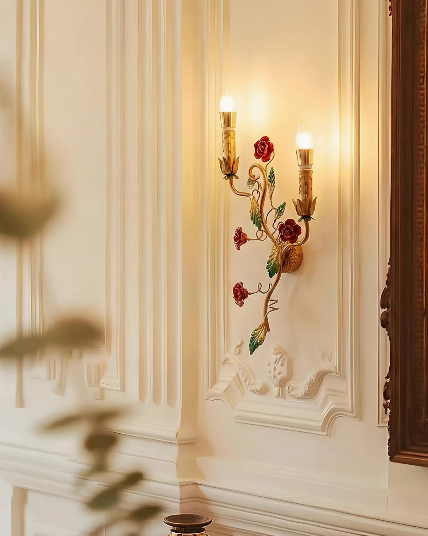 Red rose wall sconce with ornate frame mounted on decorative wooden paneled wall accent
