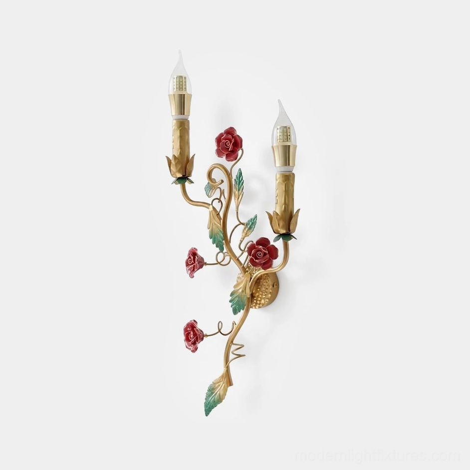 Carmelia dual candle wall sconce with gold metal frame and hand-painted red roses and green leaves, front studio view