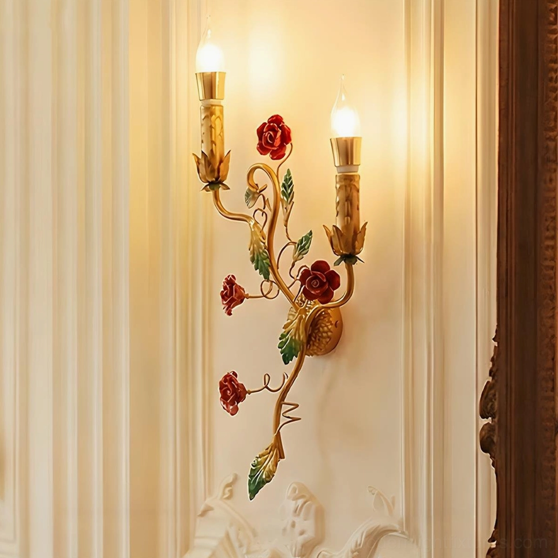 Dual candle red rose wall sconce with hand-painted botanical details in luxury carved paneled wall setting