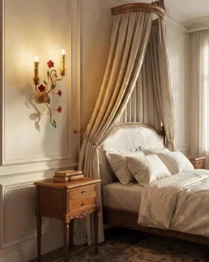 Carmelia wall sconce mounted above elegant bedroom nightstand in French country interior with red painted blossoms
