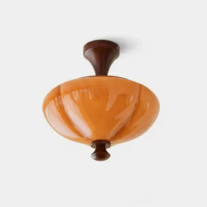 Carmelo mid-century modern amber glass ceiling light fixture with walnut wood accents, flush mount design, front studio view