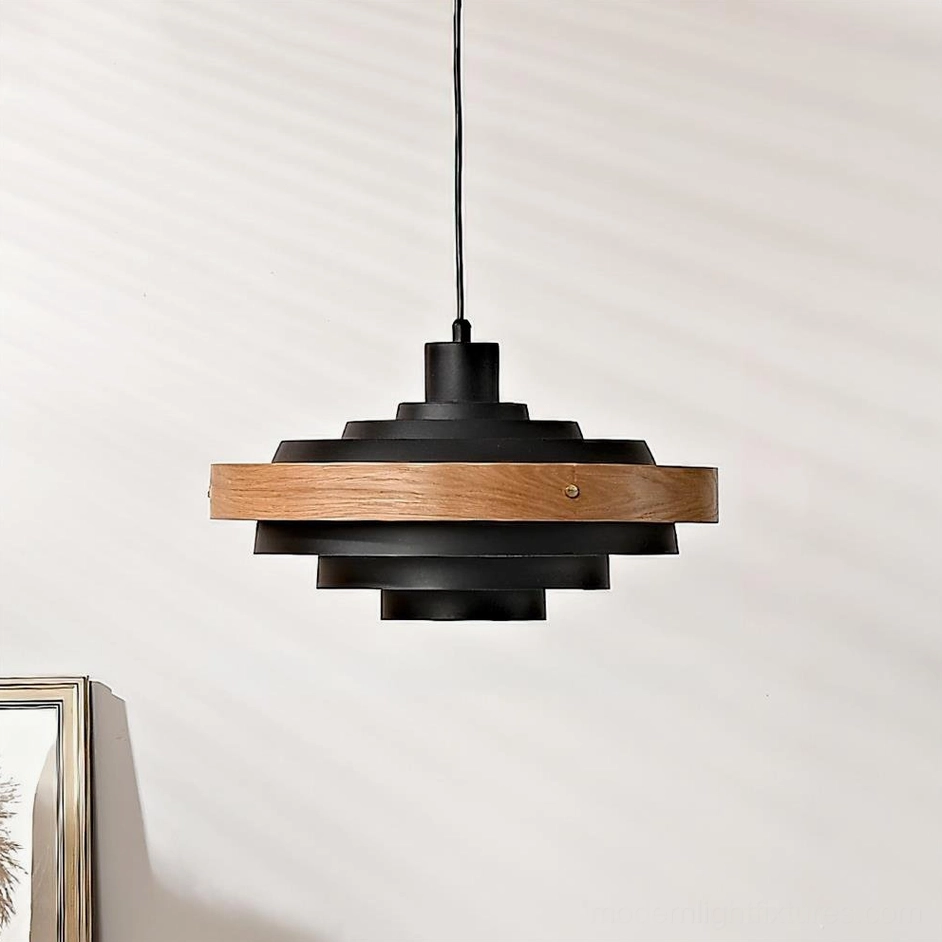 Carmen tiered pendant light in black metal and natural wood finish, clean studio product photography overhead