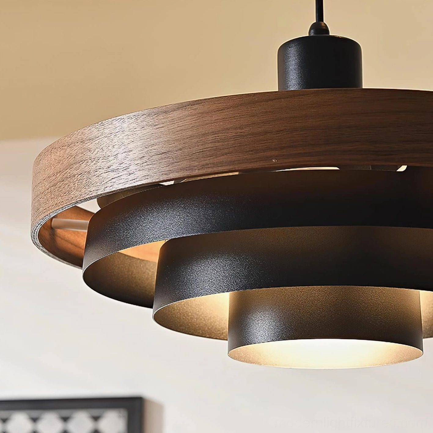 Carmen pendant lamp showing complete tiered construction, metal frame with wooden accent bands in natural finish