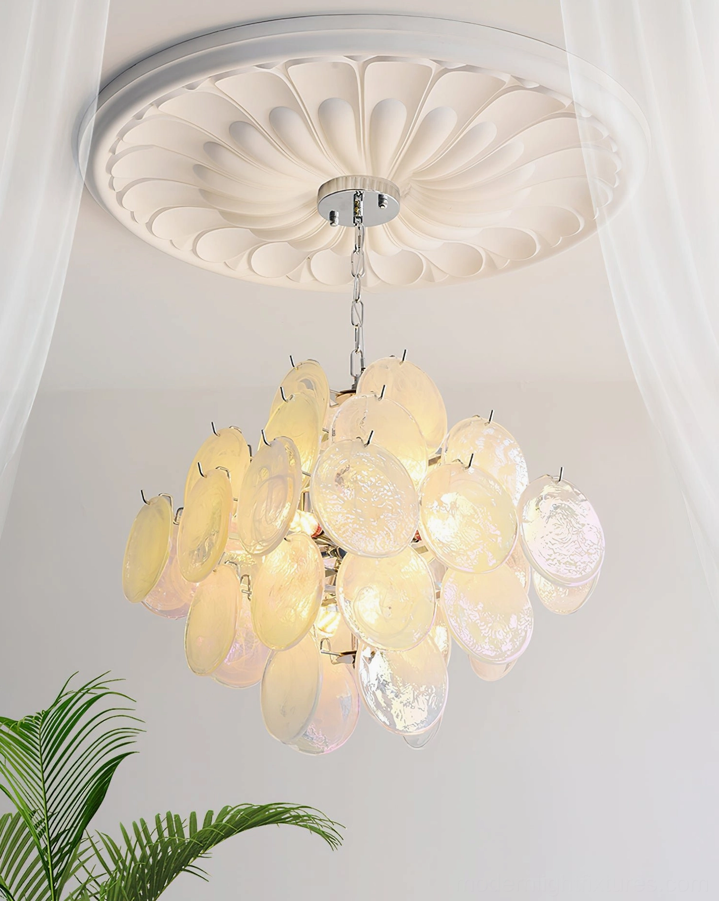 Carmosa glass disc chandelier spa wellness center modern view providing serene therapeutic ambiance lighting