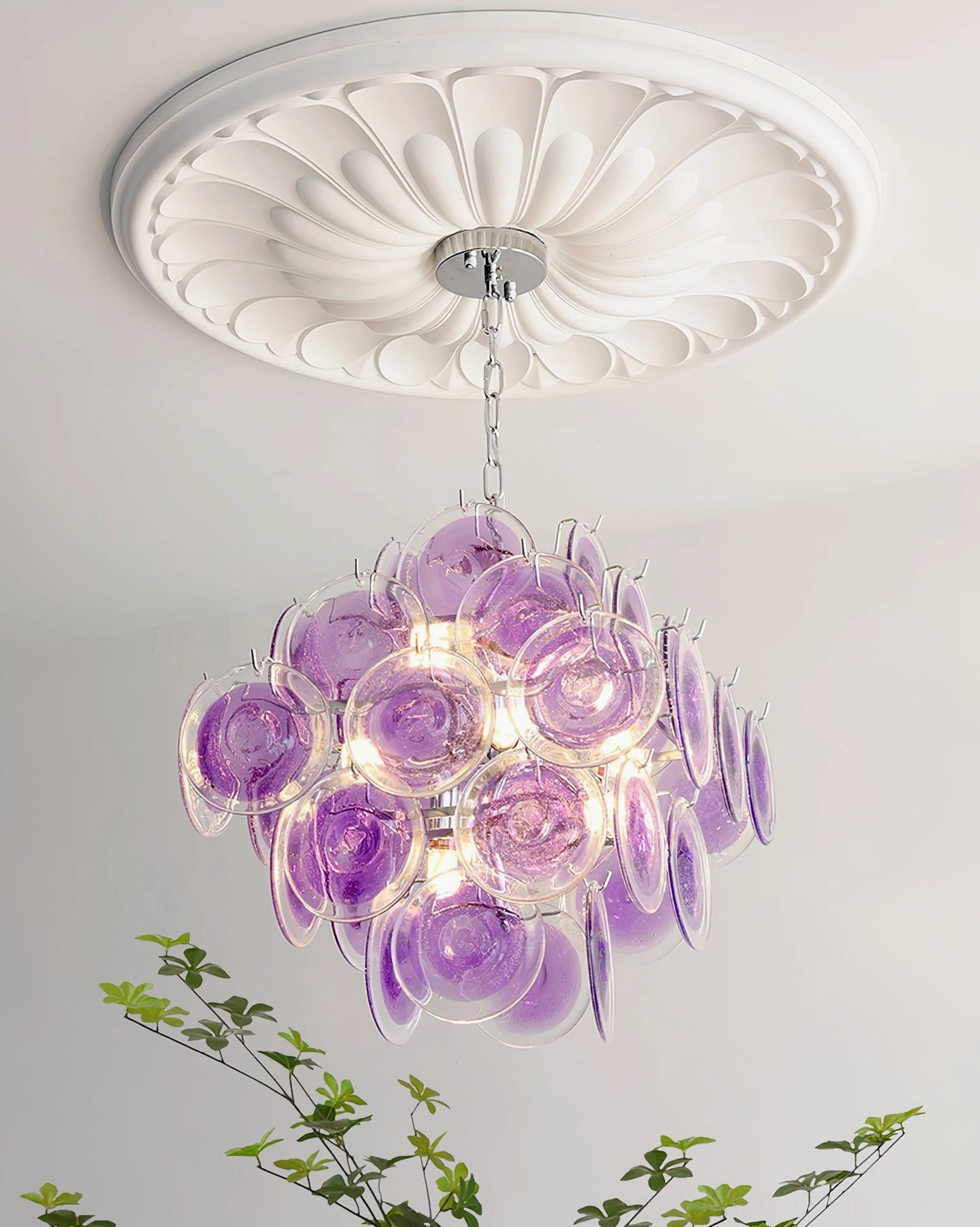 Carmosa hand-blown glass chandelier design detail macro photography revealing glass texture and refraction quality