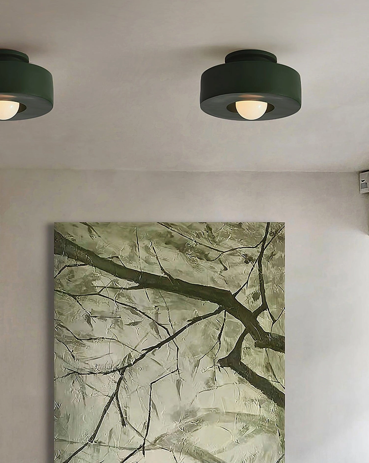 Carneros stacked resin ceiling lamp in black, three-quarter view highlighting sculptural proportions