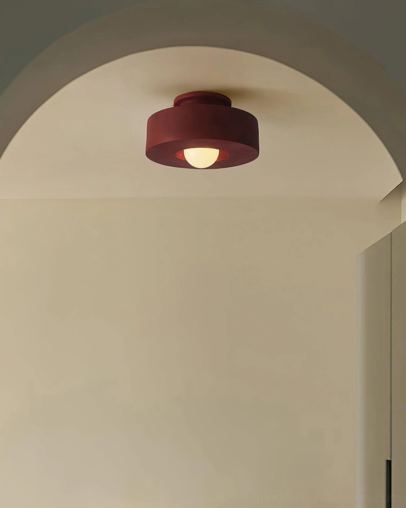 Modern Carneros stacked resin ceiling lamp installed in residential kitchen, overhead view from below