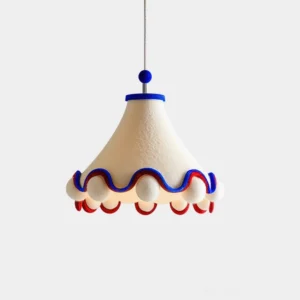 Carniva scalloped pendant light front view with blue and red trim accents on matte white resin shade