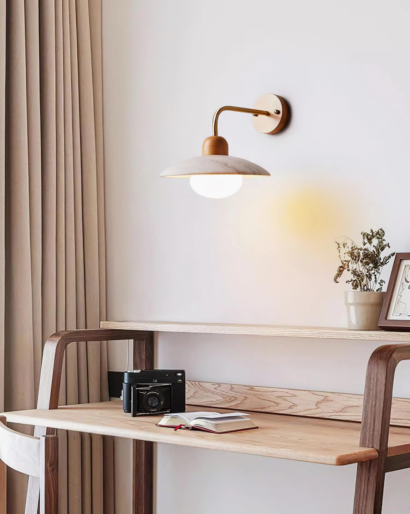Nordic study wall lamp with brass hardware and warm ambient lighting creating cozy home office atmosphere