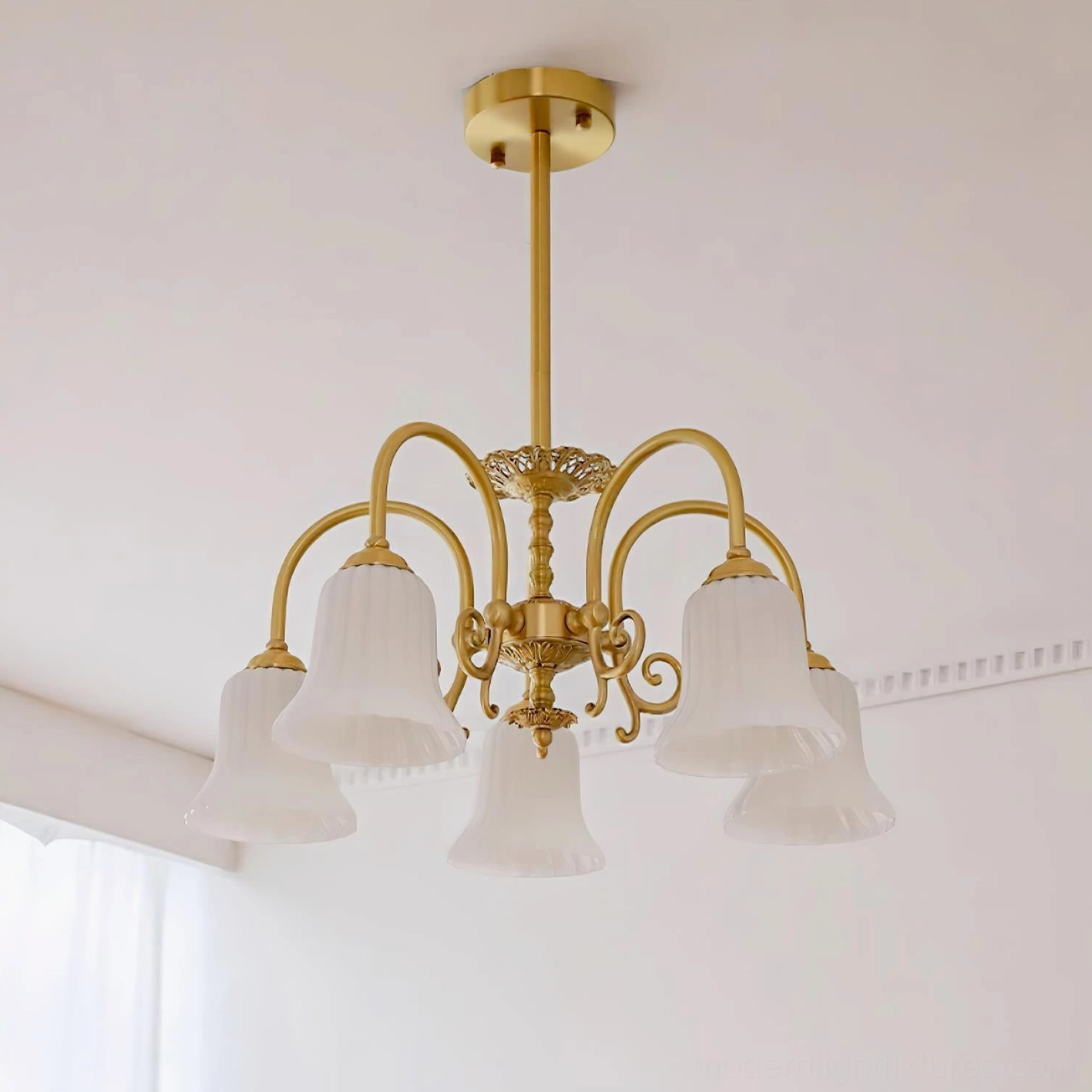 Brass chandelier mounted on ceiling with adjustable hanging rod and E26 socket compatibility