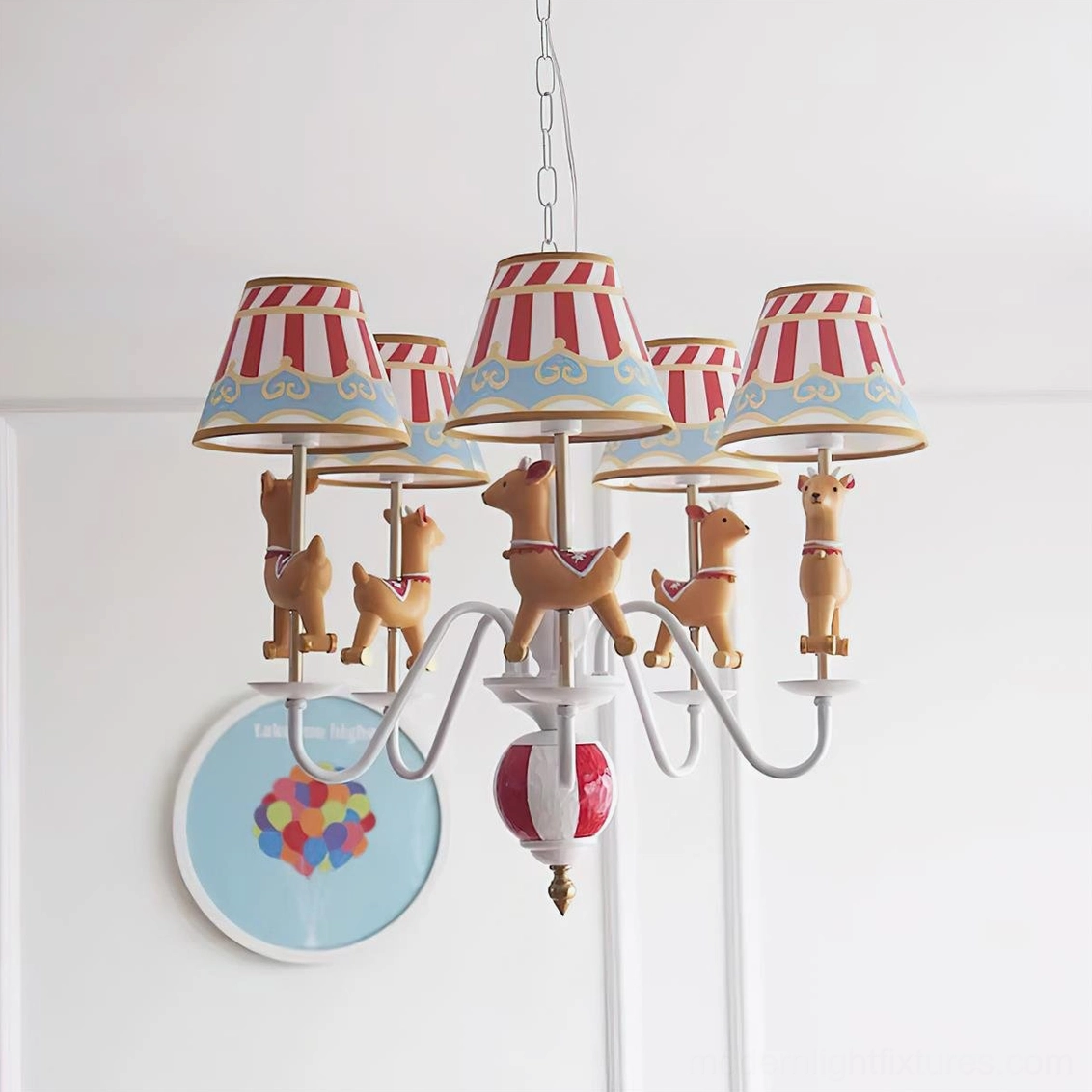 Red and yellow carousel chandelier model with gold metal construction, striped fabric shades, and vintage carnival aesthetic