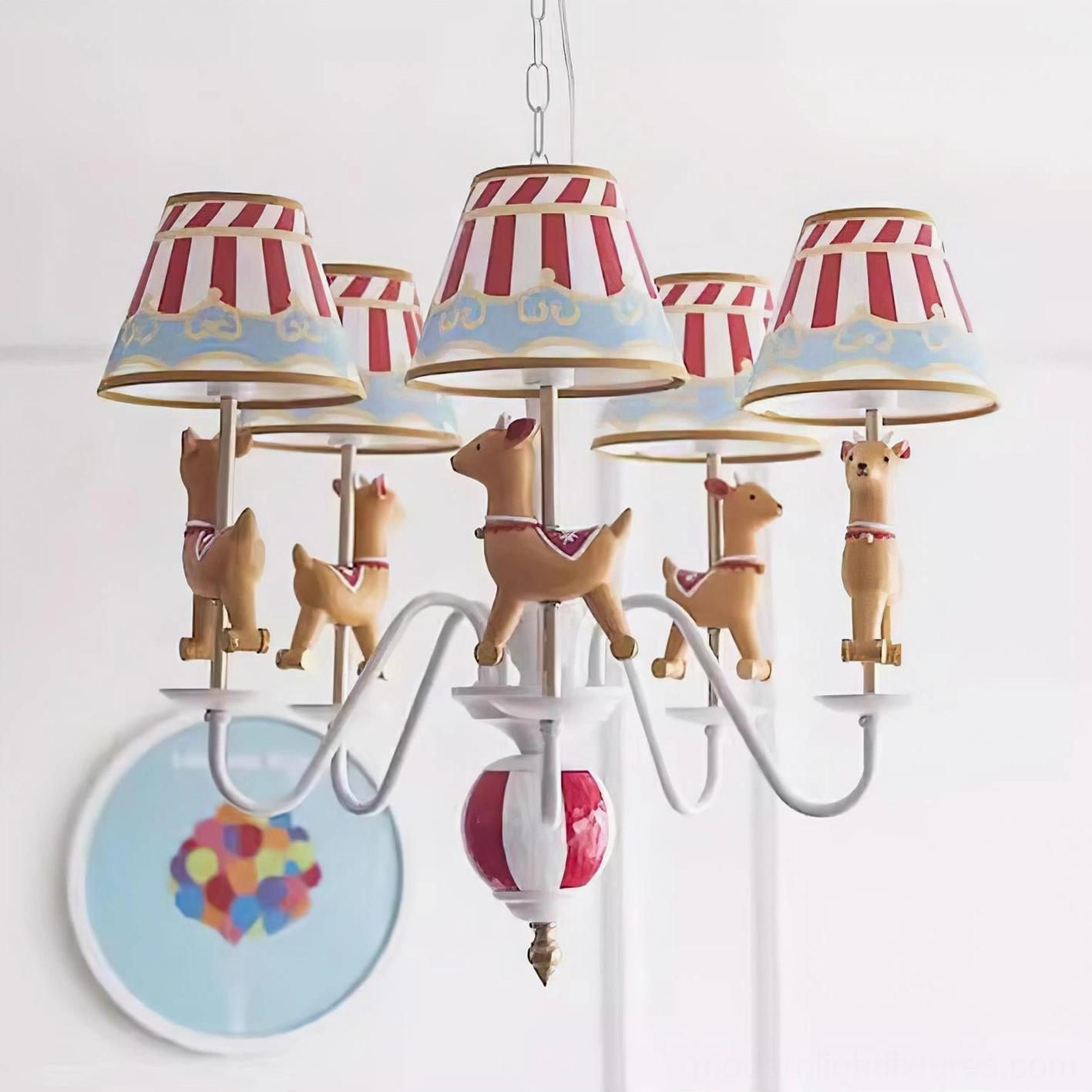 Vintage-inspired carousel chandelier with playful animal silhouettes and ornamental metal framework creating nostalgic ambiance
