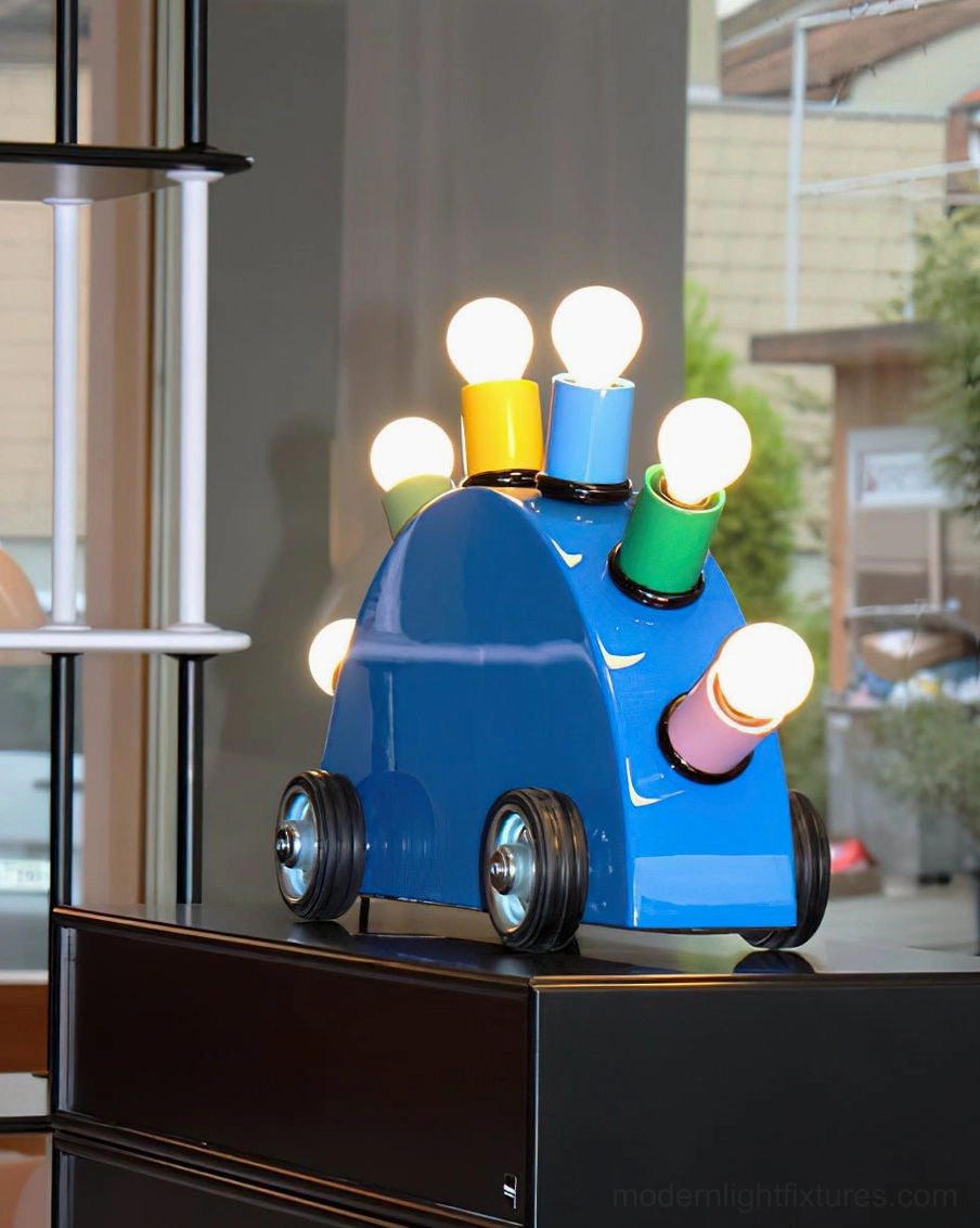 Blue cartoon car lamp displayed on dark wooden cabinet retro home decor interior styling