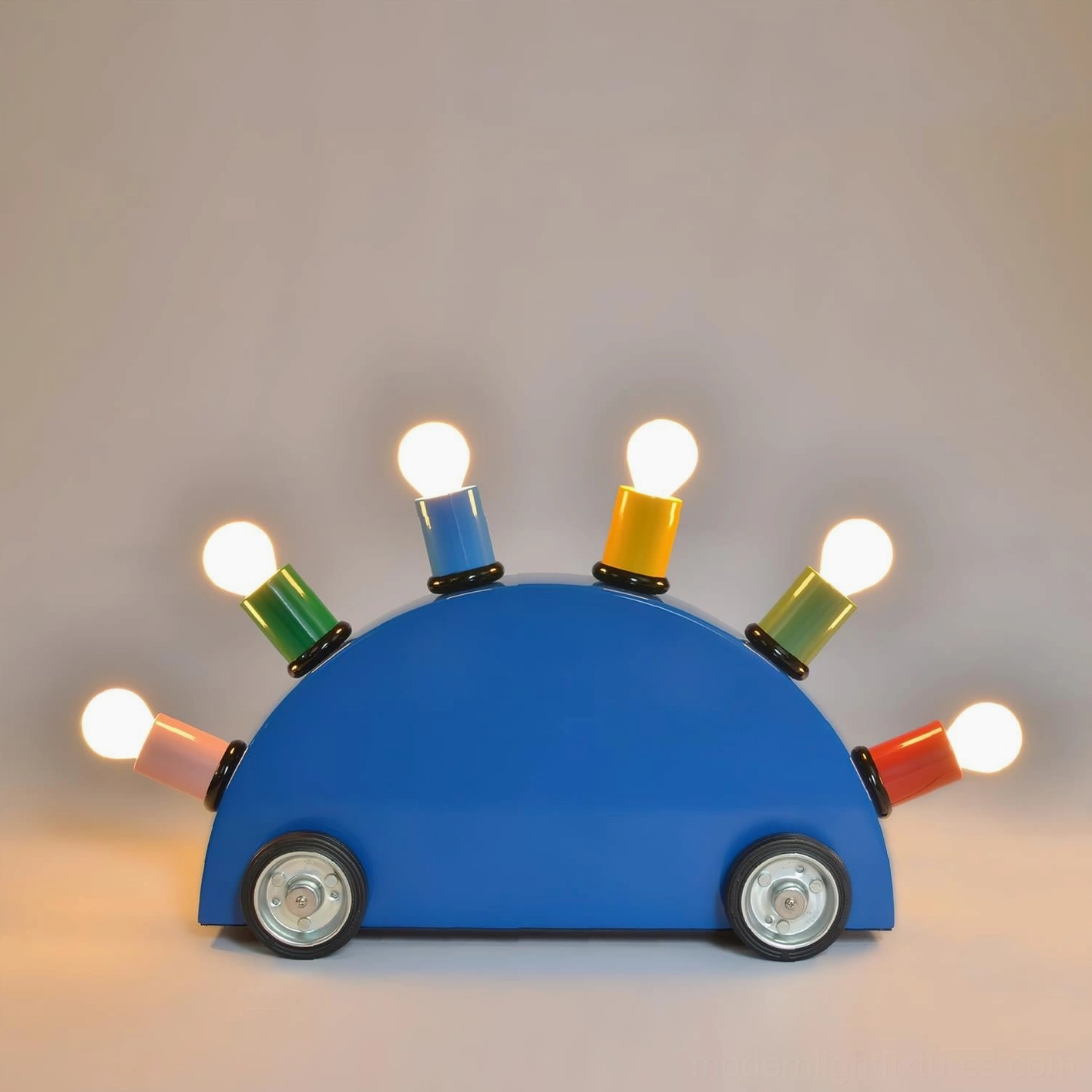 Cartoon car table lamp rear view lit with warm glowing bulbs blue glossy body