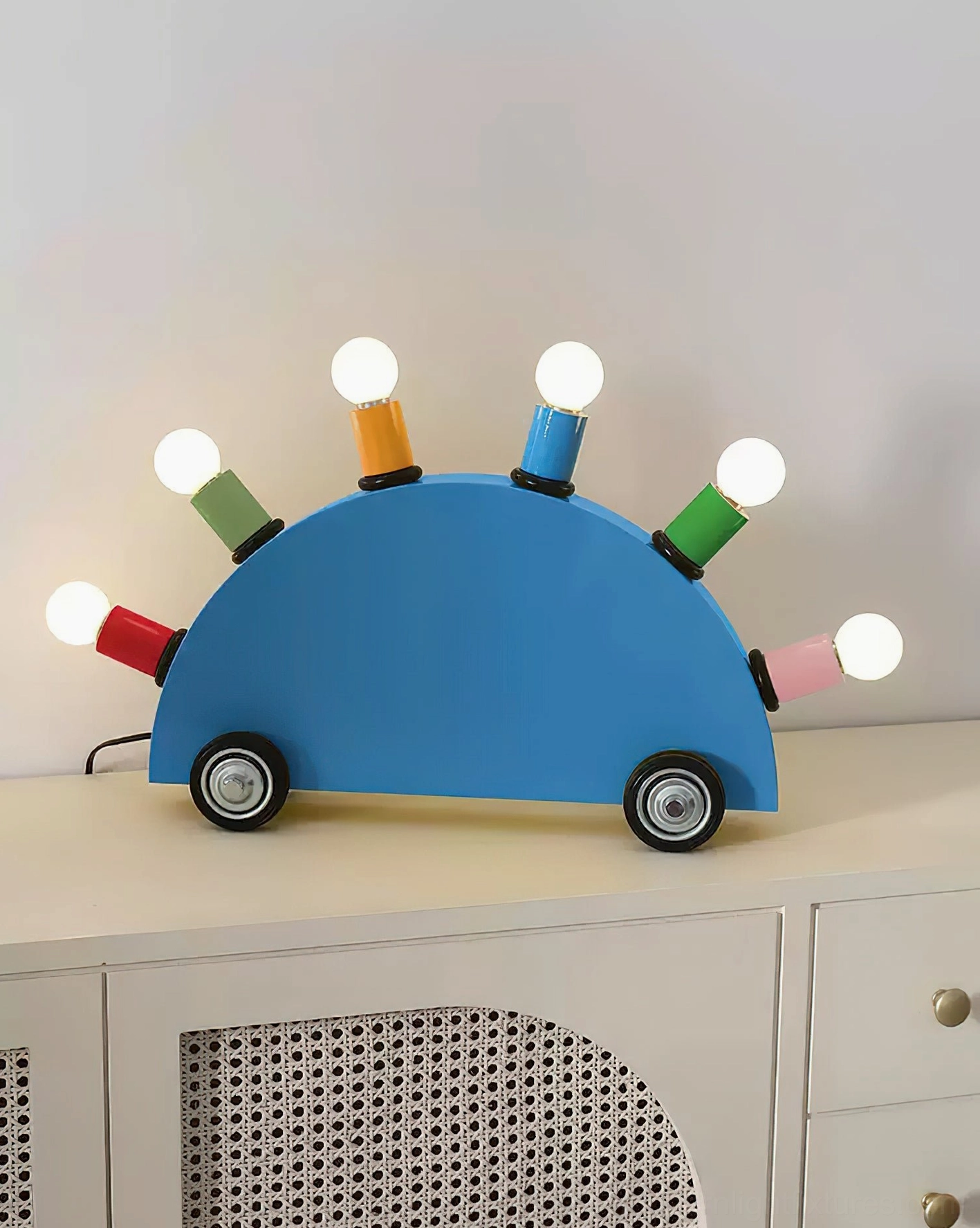 Cartoon car table lamp yellow blue color options playful modern lighting fixture