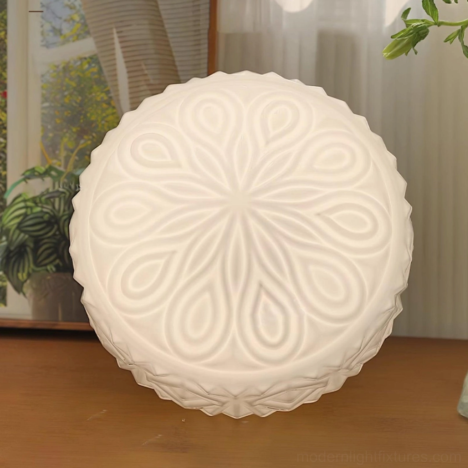 Carved glass flush mount ceiling light detail showing intricate embossed diamond and scroll artistic pattern work