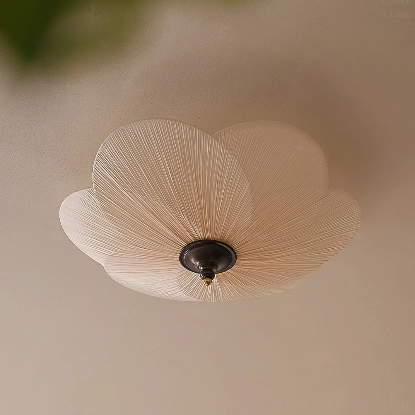 Side view of Caserta flush mount ceiling light showing pleated fabric petal design and mounting hardware