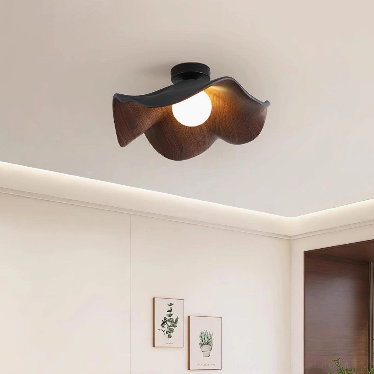 Casia modern ceiling light with softly diffused ambient light in living room space