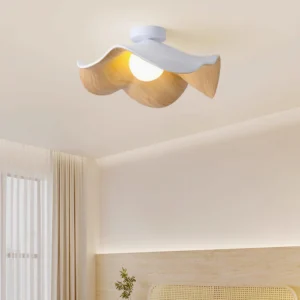 Casia ceiling light installed overhead in contemporary minimalist bedroom with warm LED bulb glow