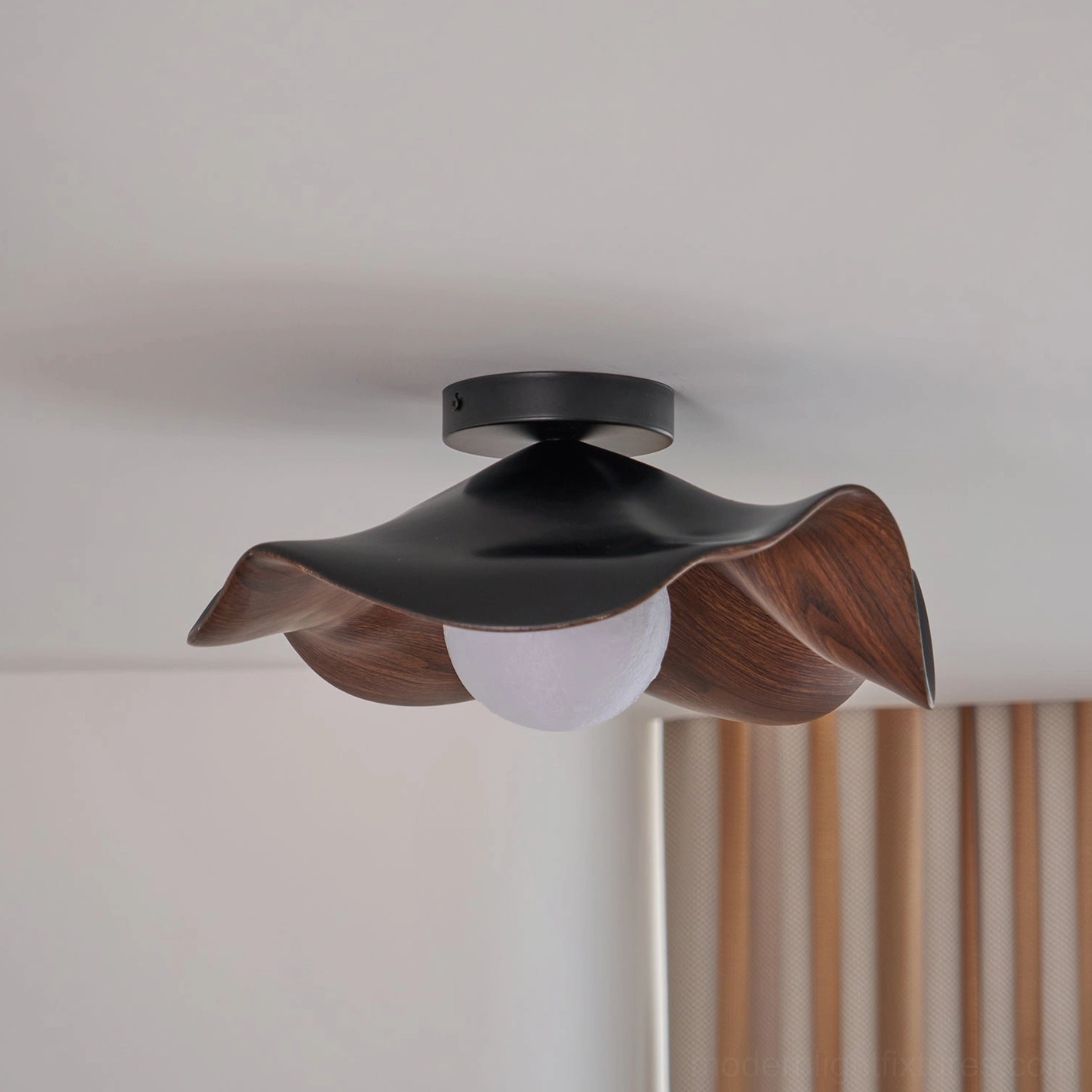 Casia ceiling light fixture with LED bulb illuminated in modern interior setting