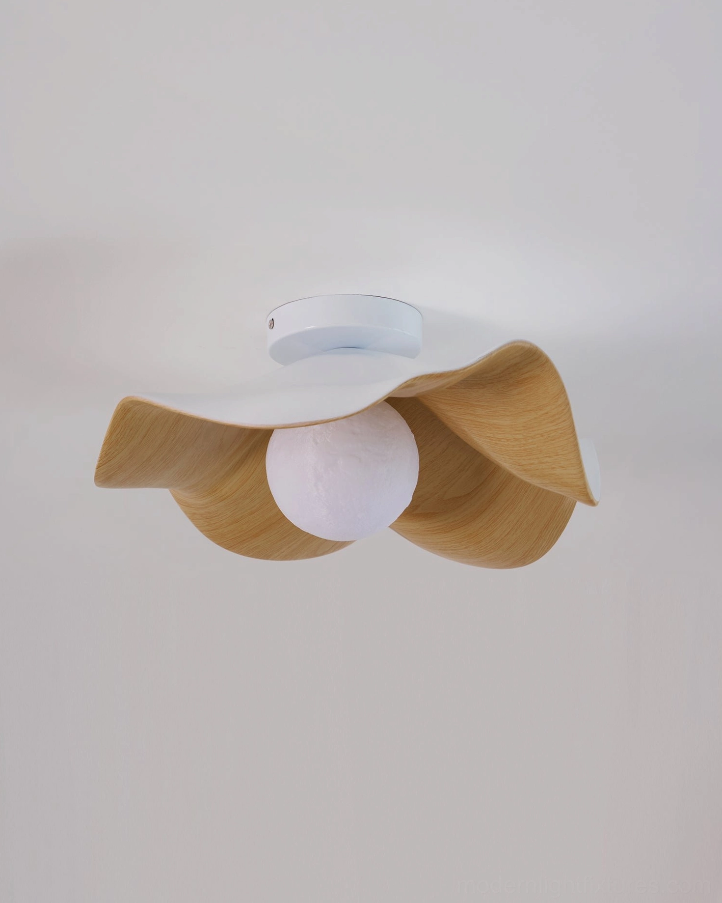 Casia ceiling light in open-plan living and dining space with layered lighting design