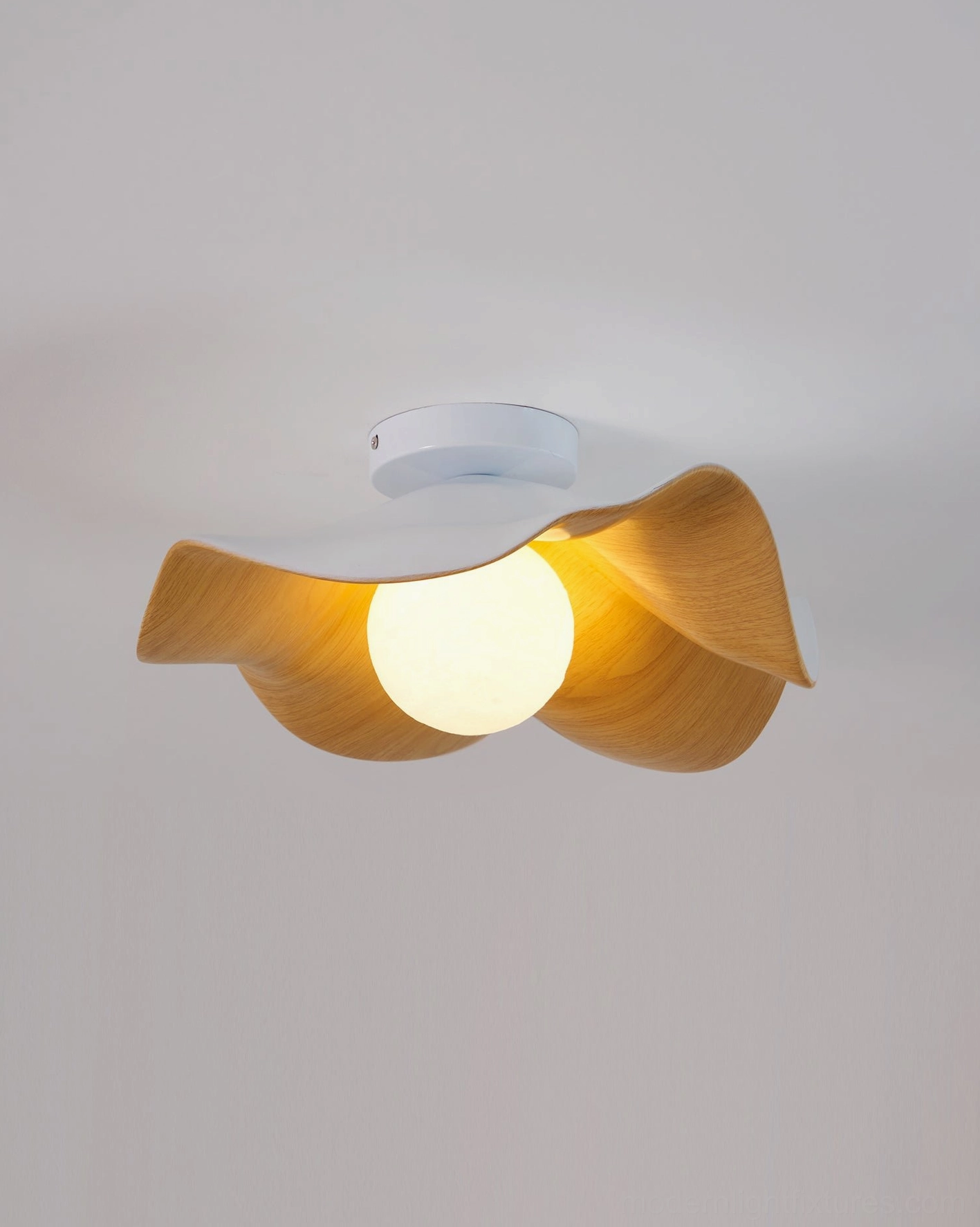 Casia modern ceiling light mounted as wall sconce beside bedroom mirror
