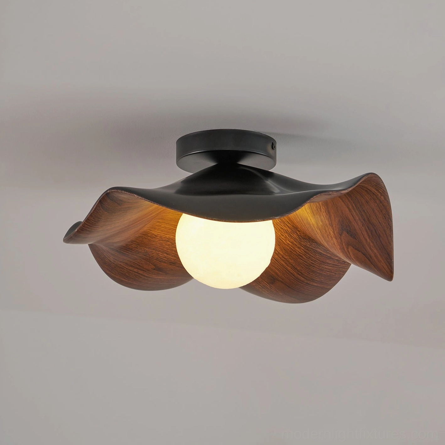 Casia modern ceiling light with warm glow diffusion through resin globe